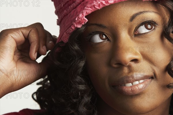 Close up of African woman wearing hat