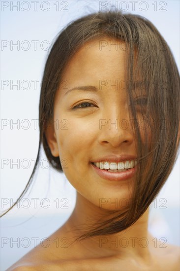 Close up of Asian woman smiling