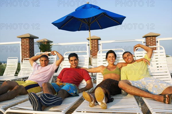 Group of friends in lounge chairs