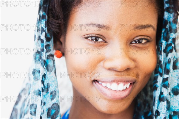 Close up of African woman wearing headscarf