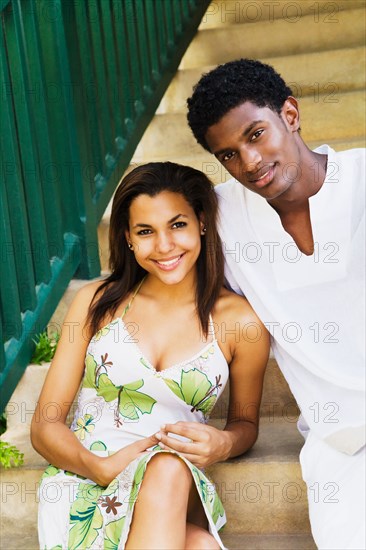 Couple sitting on steps