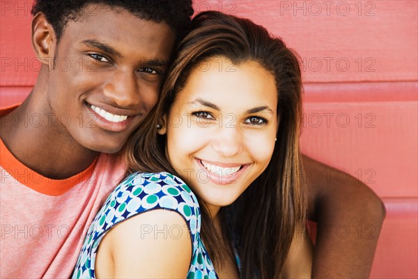 Couple hugging and smiling