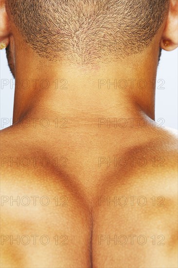 Close up of mixed race man's neck