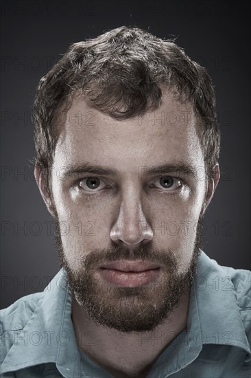 Portrait of serious man with beard