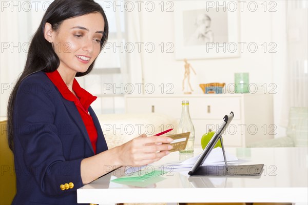 Mixed race woman online banking