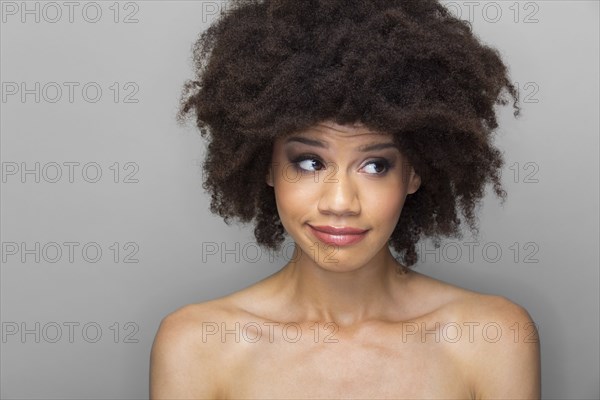 Mixed race woman smiling