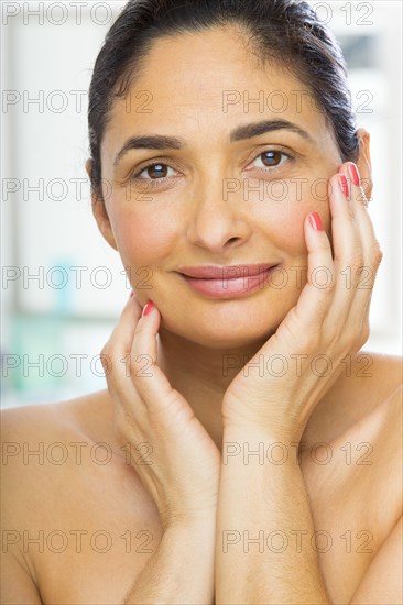 Mixed race woman smiling