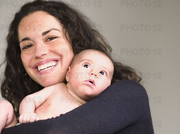 Mother holding newborn baby