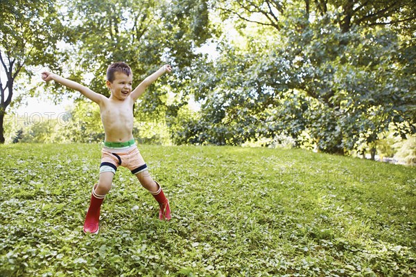 Caucasian boy playing in park