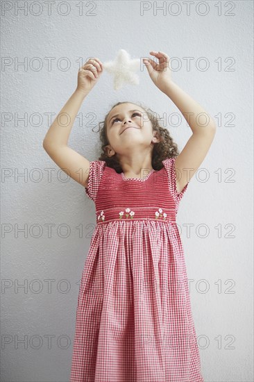 Mixed race girl admiring star