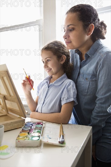 Mother and daughter painting