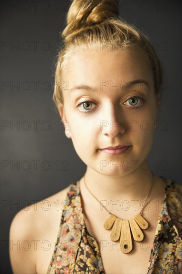 Close up of Caucasian woman wearing necklace