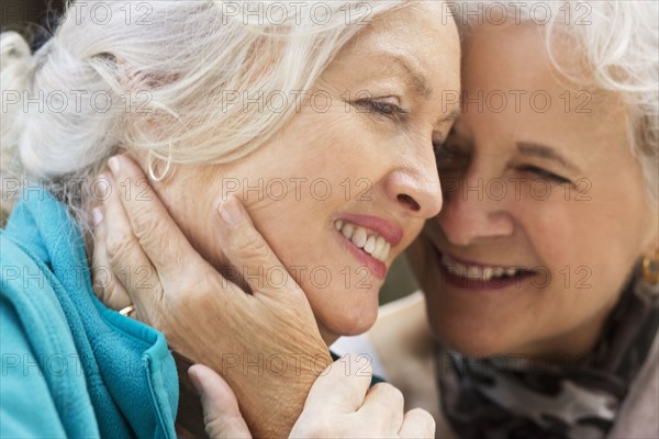 Caucasian women embracing