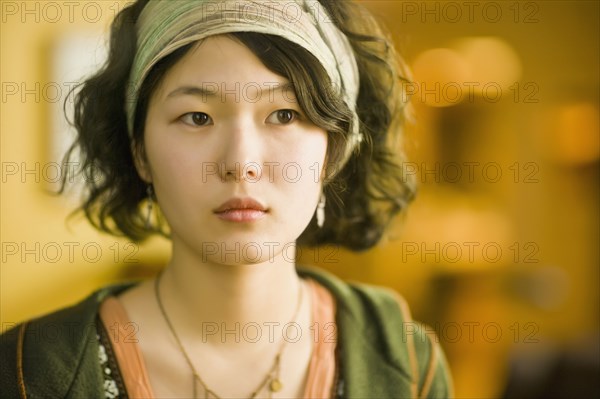 Asian woman wearing headband