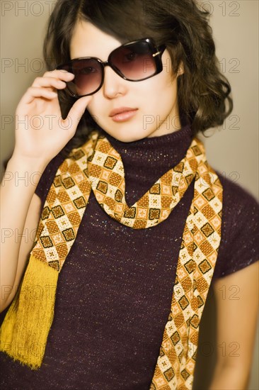 Asian woman wearing sunglasses