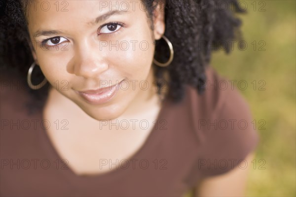 Close up of smiling mixed race woman