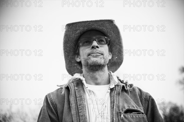 Caucasian farmer walking outdoors