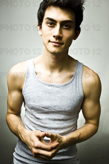 Portrait of Mixed Race man wearing tank-top