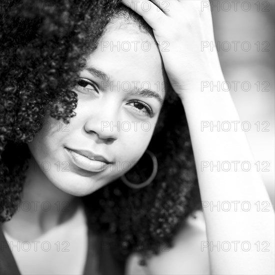 Portrait of serious Mixed Race woman