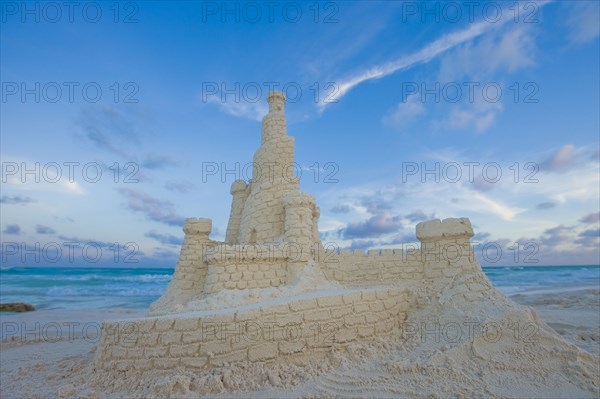 Elaborate sand castle on beach