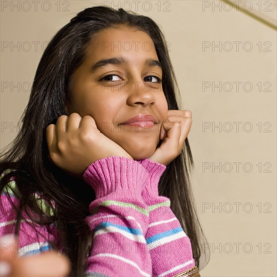 Close up of smiling Hispanic girl