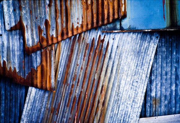 Rusty sheet metal near window