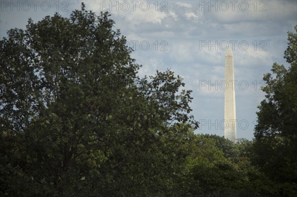 Monument overlooking treetops