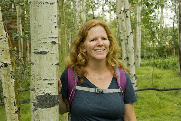 Caucasian woman hiking in forest