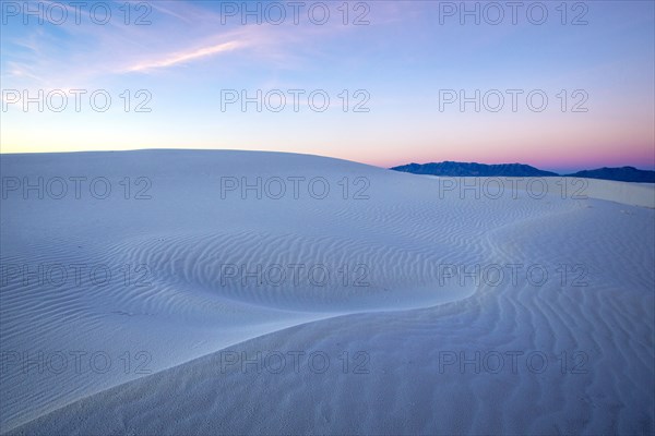 Sunrise over sand dunes