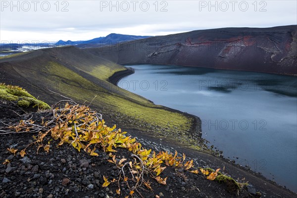 High angle view of volcanic rock and river in remote landscape