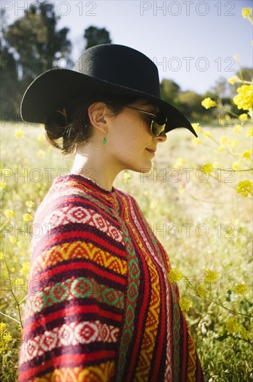 Mixed race woman in field