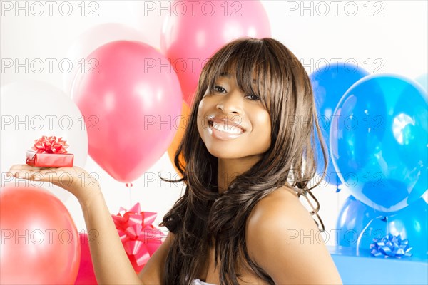 African American woman with birthday presents