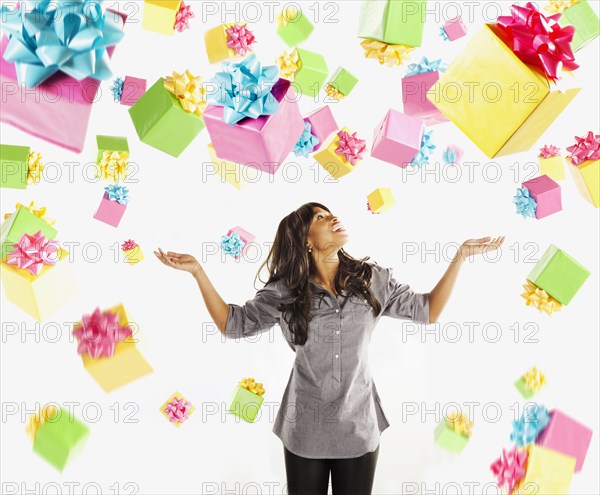 African American woman with falling birthday presents