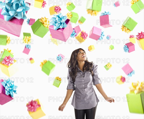 African American woman with falling birthday presents