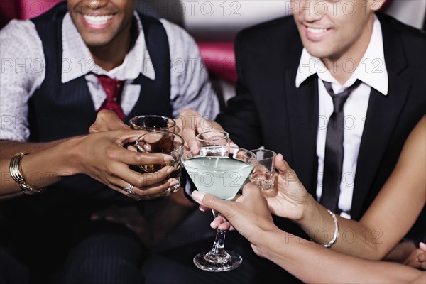 Friends toasting in nightclub
