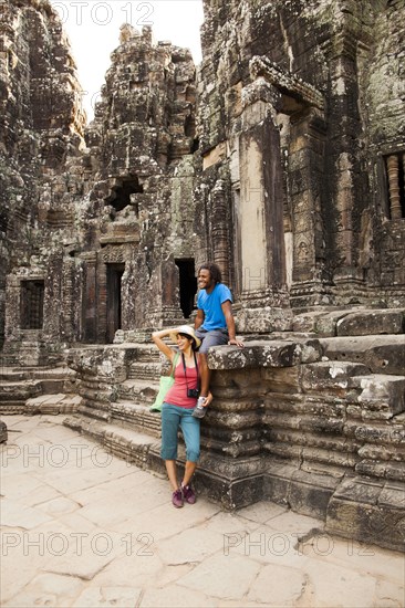 Couple visiting ancient temple