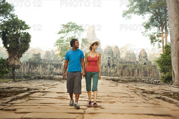 Couple visiting ancient temple