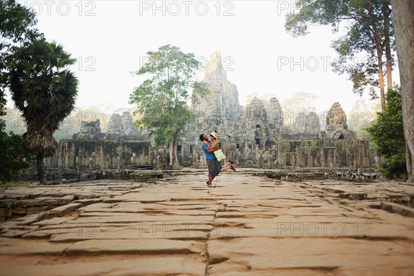 Couple visiting ancient temple