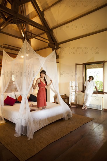 Couple relaxing in hotel room