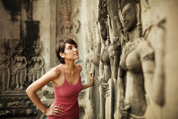 Woman visiting ancient temple