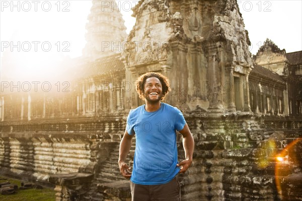 Man visiting ancient temple