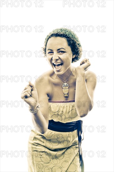 Portrait of enthusiastic woman wearing owl necklace
