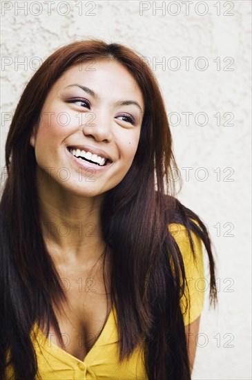 Asian woman looking sideways