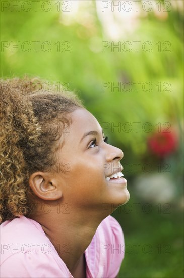 African American girl looking up