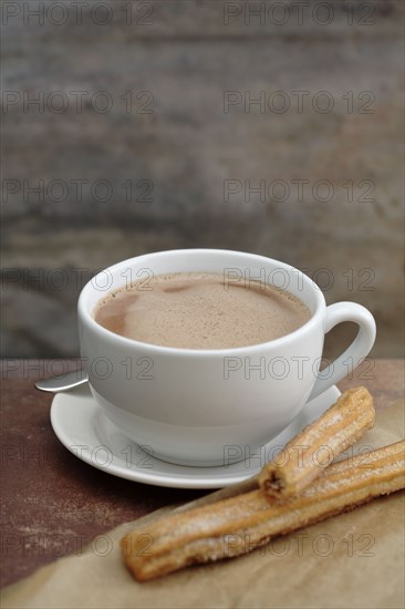 Close up of churros and Mexican hot chocolate