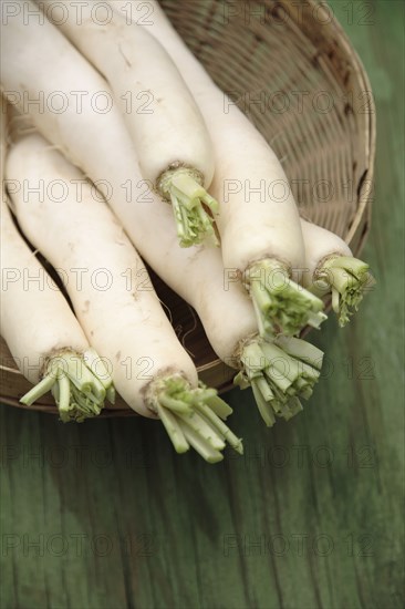 Daikon radishes in basket