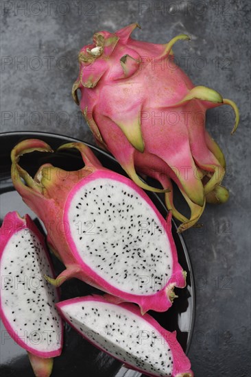 Whole and sliced dragon fruit