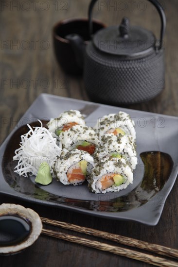 Sushi rolls and tea
