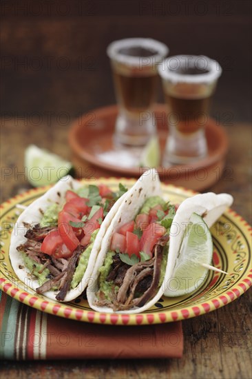 Shredded beef tacos and tequila shots