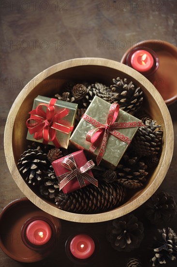 Christmas gifts in wooden bowl